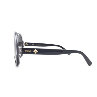 Oliver Peoples MCM615S 023 Transparent Black Round Sunglasses Gradient Gray Lens