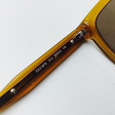 Calvin Klein CK3187S 212 Shiny Butterscotch Transp Square Sunglasses Brown 54mm